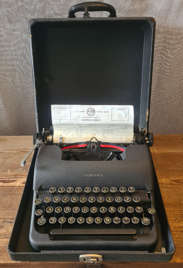 U.S. WWII Era original Corona Typewriter . D-Day marked with original Case